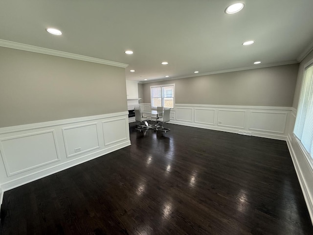 3906 W 117th St, Alsip, IL 60803 - empty room featuring crown molding, a decorative wall, recessed lighting, a wainscoted wall, and dark wood-style floors