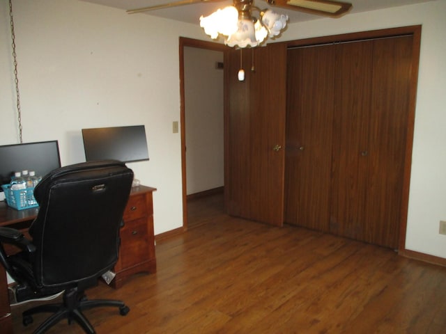 402 Heritage Ln, Ottawa, IL 61350 - home office with wood finished floors, a ceiling fan, and baseboards