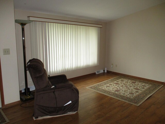 402 Heritage Ln, Ottawa, IL 61350 - sitting room with wood finished floors and baseboards