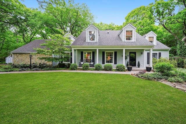 4N307 Knoll Creek Dr, Saint Charles, IL 60175 - cape cod-style house featuring covered porch, a front lawn, and a shingled roof