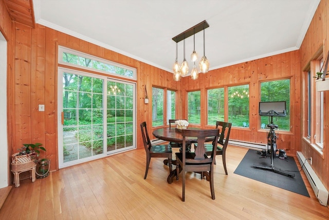 4N307 Knoll Creek Dr, Saint Charles, IL 60175 - dining area with crown molding, plenty of natural light, a baseboard heating unit, wooden walls, and a chandelier
