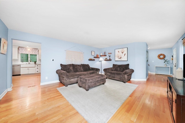 4N307 Knoll Creek Dr, Saint Charles, IL 60175 - living area featuring light wood-style flooring and baseboards