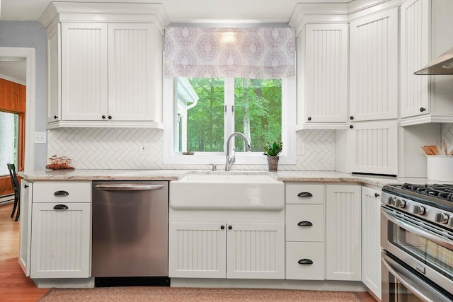4N307 Knoll Creek Dr, Saint Charles, IL 60175 - kitchen with appliances with stainless steel finishes, a sink, decorative backsplash, light stone countertops, and crown molding