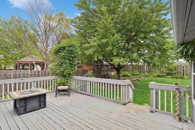 125 W Sprucewood Ln, Round Lake Beach, IL 60073 - wooden deck featuring a gazebo and a fenced backyard