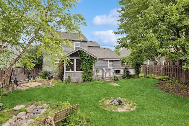 125 W Sprucewood Ln, Round Lake Beach, IL 60073 - fenced backyard featuring a wooden deck