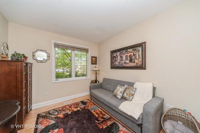 7410 Lincoln Ave Unit A, Skokie, IL 60076 - living room with light wood-style floors and baseboards