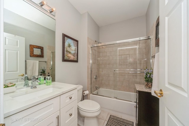 7410 Lincoln Ave Unit A, Skokie, IL 60076 - full bath with vanity, toilet, shower / bath combination with glass door, and tile patterned flooring