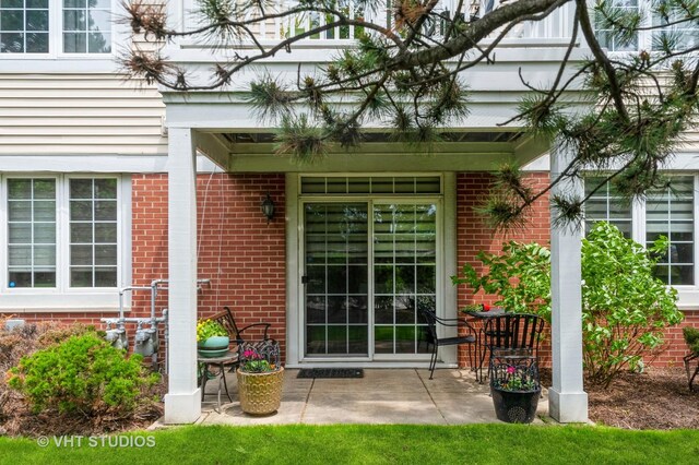 7410 Lincoln Ave Unit A, Skokie, IL 60076 - view of exterior entry featuring brick siding