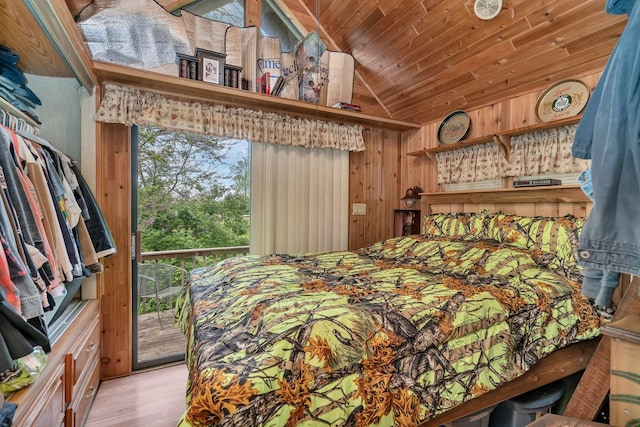 1 Dinosaur Rd, Wilmington, IL 60481 - bedroom featuring vaulted ceiling, wooden walls, wood finished floors, access to outside, and wood ceiling