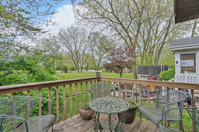 1 Dinosaur Rd, Wilmington, IL 60481 - wooden terrace featuring a lawn