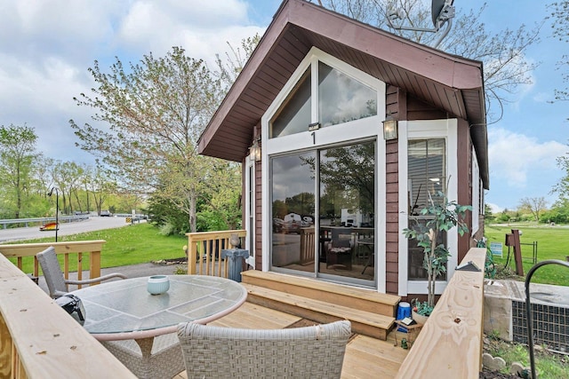 1 Dinosaur Rd, Wilmington, IL 60481 - wooden terrace featuring a yard and central AC unit