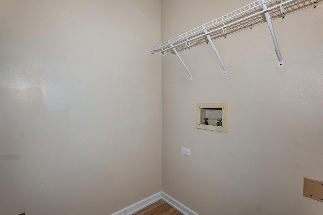 931 Mosby Ct, Joliet, IL 60431 - washroom featuring baseboards, hookup for a washing machine, and wood finished floors
