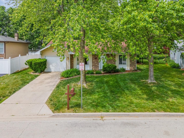 931 Mosby Ct, Joliet, IL 60431 - view of property hidden behind natural elements with concrete driveway, an attached garage, and brick siding