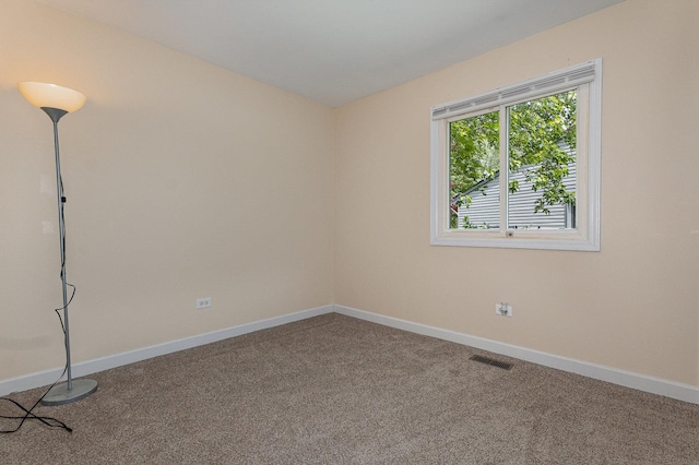 931 Mosby Ct, Joliet, IL 60431 - carpeted empty room with baseboards