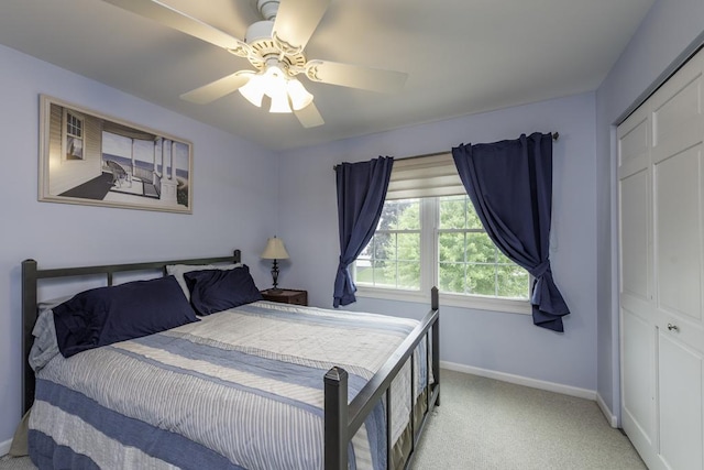 1161 Sumner Cir, Gurnee, IL 60031 - bedroom featuring baseboards, light carpet, a closet, and ceiling fan