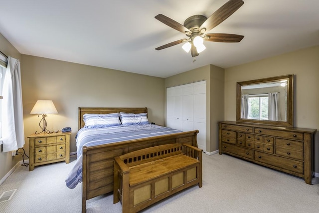 1161 Sumner Cir, Gurnee, IL 60031 - carpeted bedroom with baseboards, a closet, and a ceiling fan
