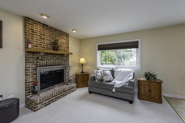 1161 Sumner Cir, Gurnee, IL 60031 - carpeted living area featuring a brick fireplace and baseboards