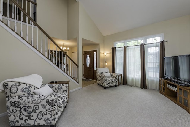 1161 Sumner Cir, Gurnee, IL 60031 - carpeted living area featuring stairs, a chandelier, high vaulted ceiling, and baseboards
