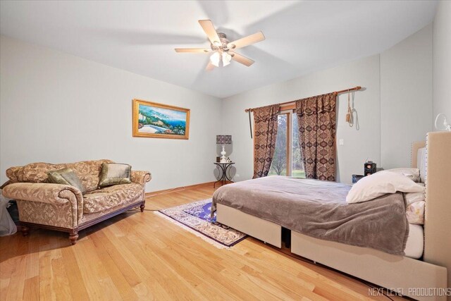 13851 S Janas Pkwy, Homer Glen, IL 60491 - bedroom featuring wood finished floors, a ceiling fan, access to exterior, and baseboards