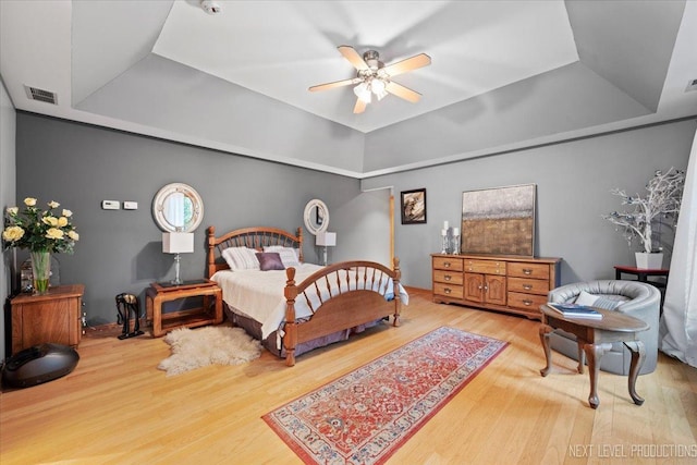 13851 S Janas Pkwy, Homer Glen, IL 60491 - bedroom featuring a tray ceiling, wood finished floors, and ceiling fan