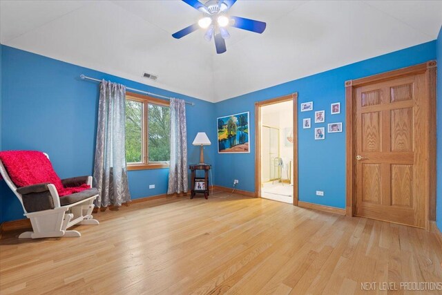 13851 S Janas Pkwy, Homer Glen, IL 60491 - sitting room with wood finished floors, a ceiling fan, baseboards, and lofted ceiling