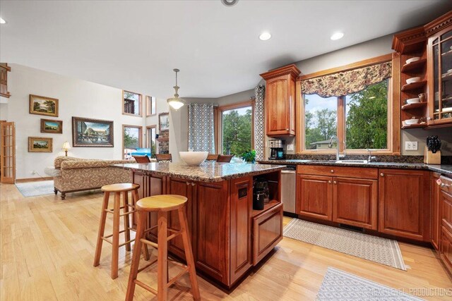 13851 S Janas Pkwy, Homer Glen, IL 60491 - kitchen featuring a sink, light wood-type flooring, a breakfast bar, dark stone counters, and recessed lighting