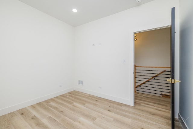 5530 S Michigan Ave, Chicago, IL 60637 - spare room featuring wood finished floors, baseboards, and recessed lighting