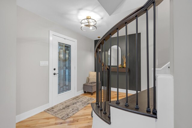 274 University Dr, Buffalo Grove, IL 60089 - entrance foyer featuring light wood finished floors, baseboards, a chandelier, and stairway