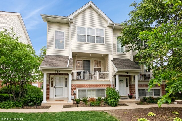 773 Pheasant Trl Unit 773, Saint Charles, IL 60174 - townhome / multi-family property with roof with shingles and brick siding