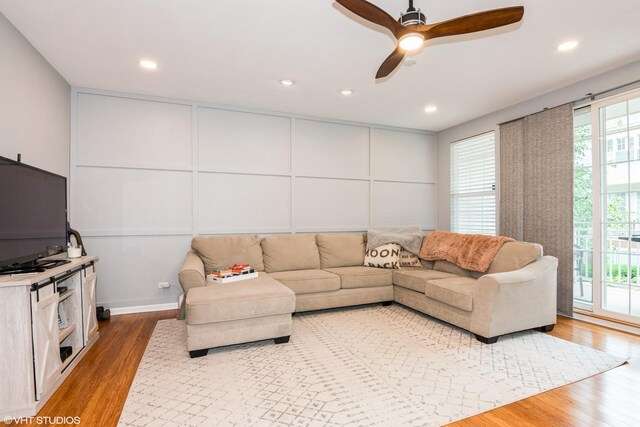 773 Pheasant Trl Unit 773, Saint Charles, IL 60174 - living room with wood finished floors, a ceiling fan, recessed lighting, and a decorative wall