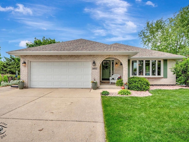 14802 Anne Ct, Oak Forest, IL 60452 - ranch-style home featuring brick siding, concrete driveway, a front yard, and an attached garage