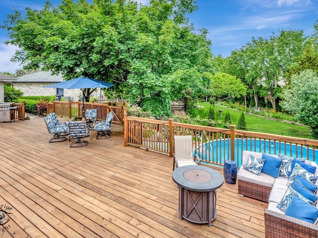 14802 Anne Ct, Oak Forest, IL 60452 - deck featuring outdoor dining area, an outdoor pool, view of wooded area, and an outdoor hangout area