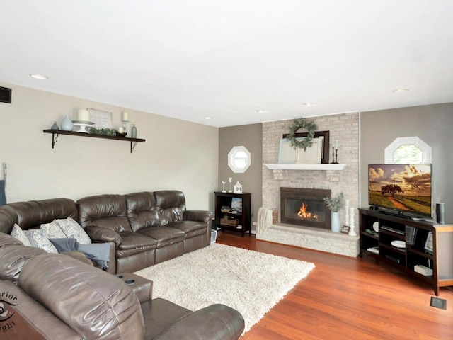 14802 Anne Ct, Oak Forest, IL 60452 - living room featuring wood finished floors, a fireplace, and recessed lighting
