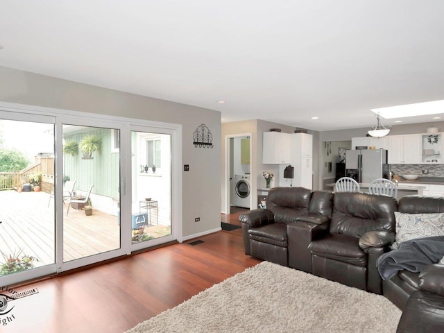 14802 Anne Ct, Oak Forest, IL 60452 - living area featuring washer / clothes dryer, dark wood-style floors, and recessed lighting