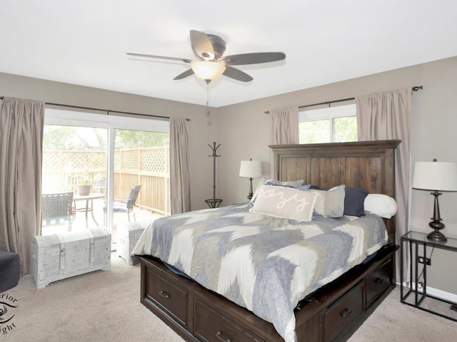 14802 Anne Ct, Oak Forest, IL 60452 - bedroom with multiple windows, light carpet, a ceiling fan, and access to exterior