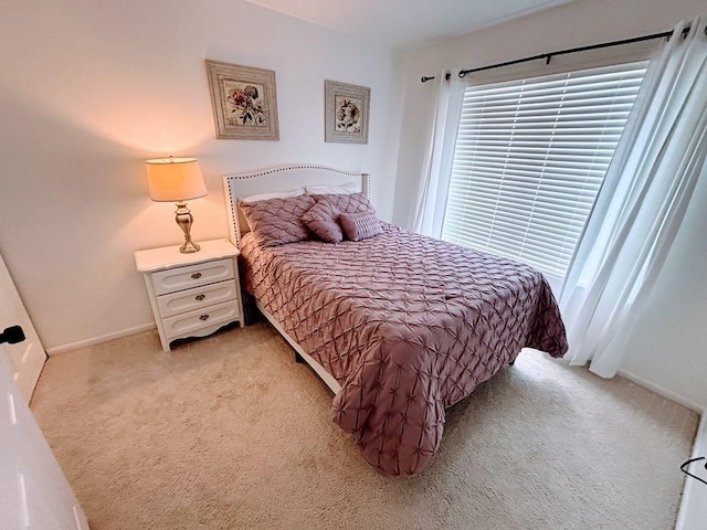 915 Manchester Cir, Grayslake, IL 60030 - bedroom featuring light colored carpet and baseboards
