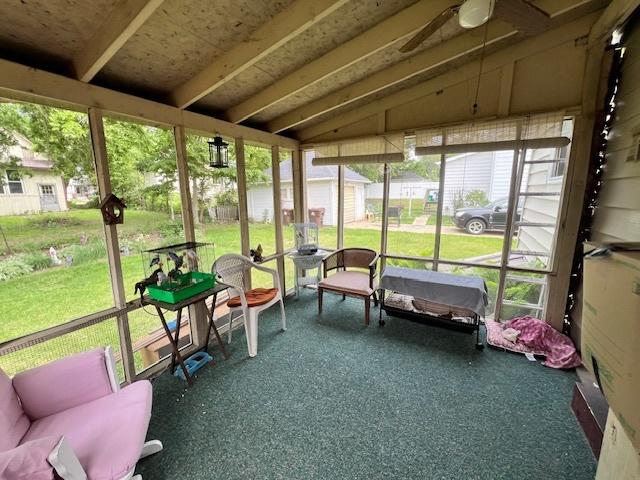 520 W American St, Freeport, IL 61032 - sunroom featuring ceiling fan