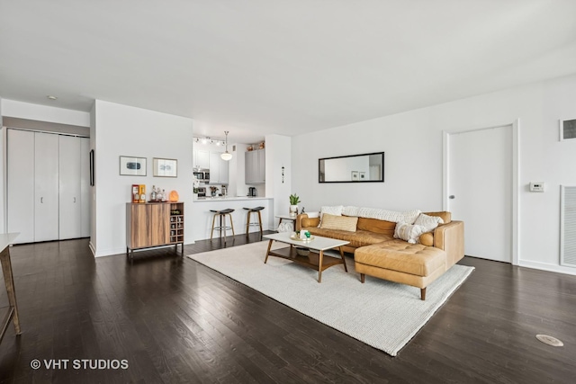 501 N Clinton St Unit 1804, Chicago, IL 60654 - living room with dark wood-style flooring and track lighting