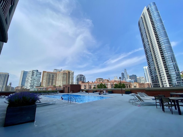 501 N Clinton St Unit 1804, Chicago, IL 60654 - community pool featuring a skyline view and a patio