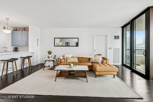 501 N Clinton St Unit 1804, Chicago, IL 60654 - living room featuring dark wood-style floors and a wall of windows