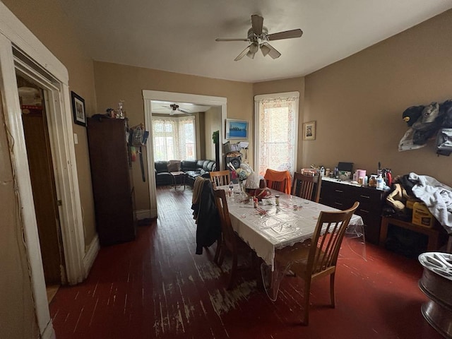 1530 N Springfield Ave, Chicago, IL 60651 - dining area featuring a ceiling fan, wood finished floors, and baseboards