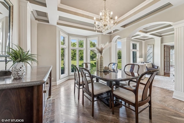 26 Forest Ln, South Barrington, IL 60010 - dining area featuring coffered ceiling, arched walkways, ornamental molding, decorative columns, and a chandelier