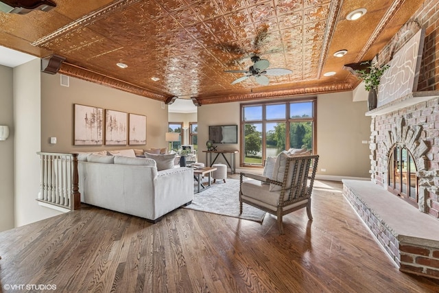 26 Forest Ln, South Barrington, IL 60010 - living room with wood finished floors, a ceiling fan, a large fireplace, an ornate ceiling, and recessed lighting