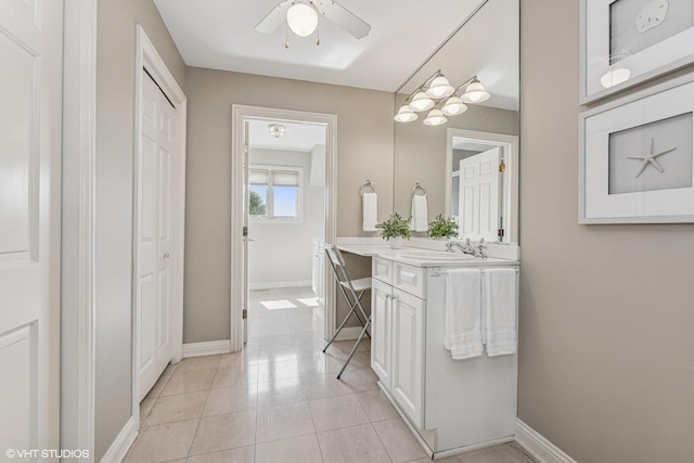 26 Forest Ln, South Barrington, IL 60010 - bathroom with double vanity, a ceiling fan, and tile patterned floors