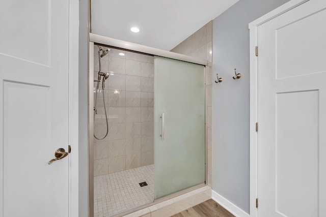 405 S Carol Ln, Braidwood, IL 60408 - bathroom featuring a stall shower, recessed lighting, baseboards, and wood finished floors