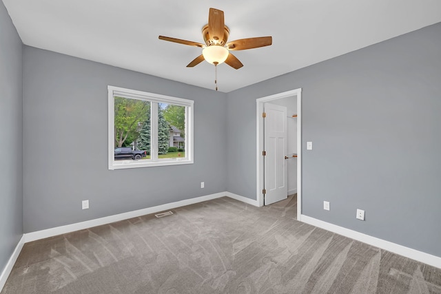 405 S Carol Ln, Braidwood, IL 60408 - empty room with ceiling fan, baseboards, and carpet
