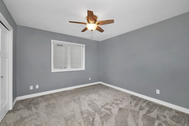 405 S Carol Ln, Braidwood, IL 60408 - carpeted empty room with a ceiling fan and baseboards
