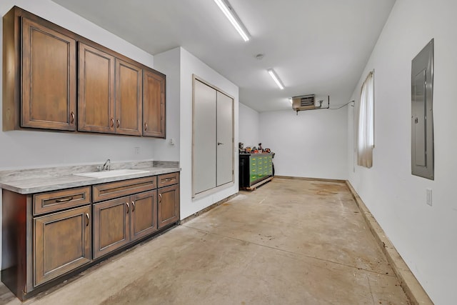 405 S Carol Ln, Braidwood, IL 60408 - garage featuring a sink, electric panel, and a heating unit