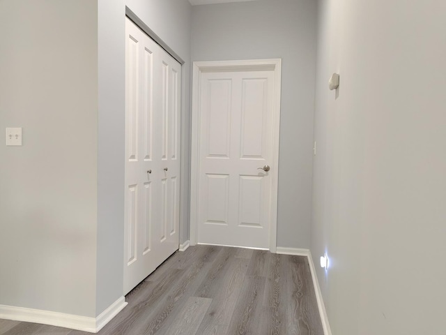 1931 Chase Ln Unit 1931, Aurora, IL 60502 - hallway with light wood-type flooring and baseboards
