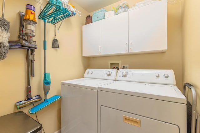 8340 Callie Ave Unit 105, Morton Grove, IL 60053 - washroom featuring separate washer and dryer and cabinet space